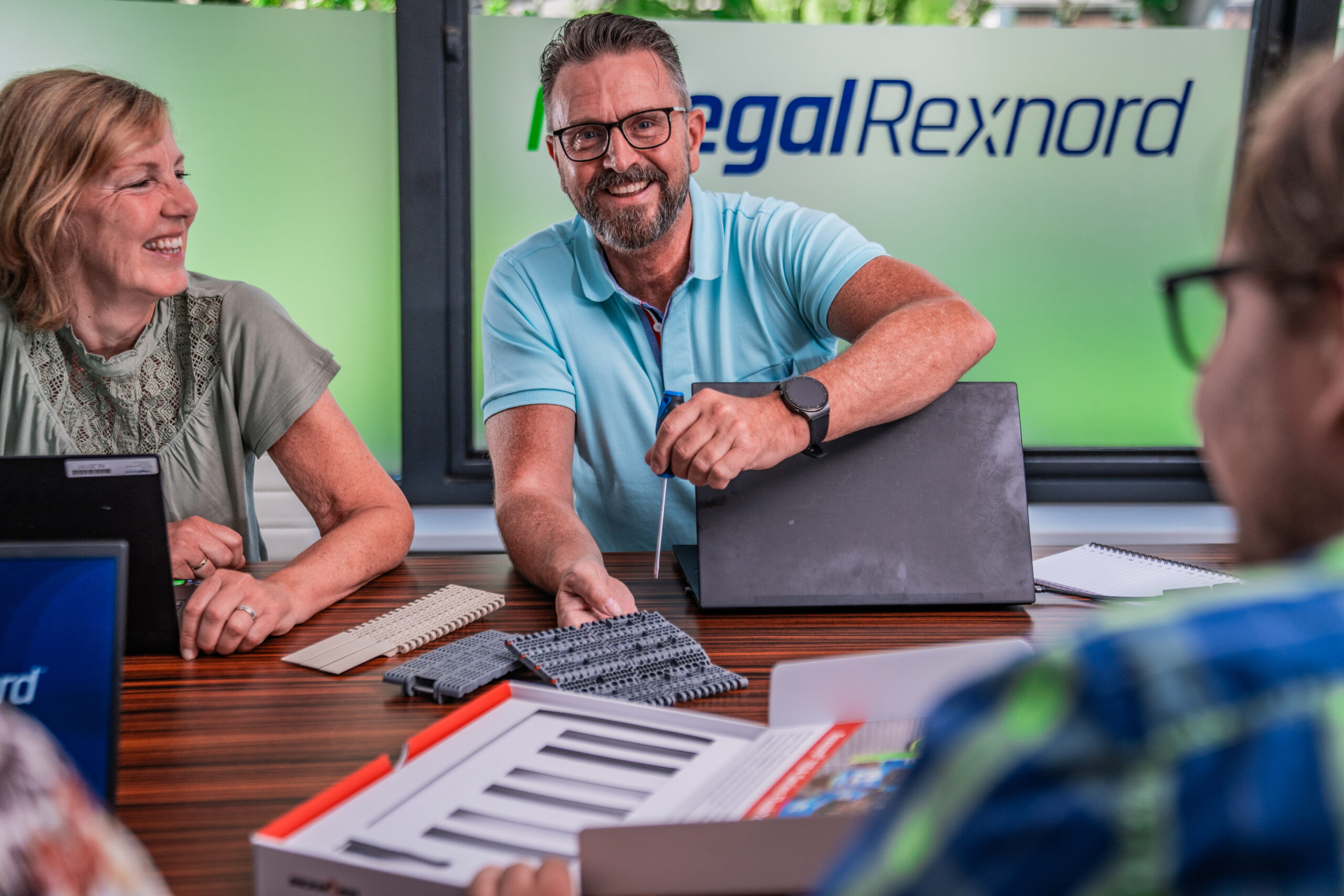 Regal Rexnord specialist working with conveyor belt components